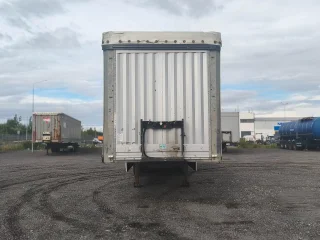 Шторный полуприцеп Koluman