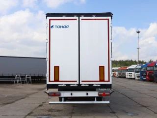 Сцепка седельный тягач Foton A 1846 ADR 4x2 и шторный полуприцеп Тонар 9888