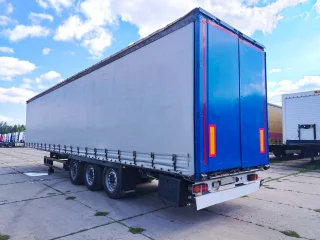 Шторный полуприцеп Krone