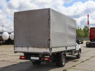 Бортовой тентованный фургон Ford