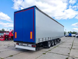 Шторный полуприцеп Krone