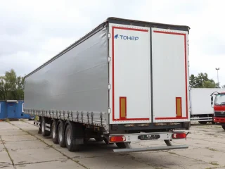 Шторно-бортовой полуприцеп Тонар